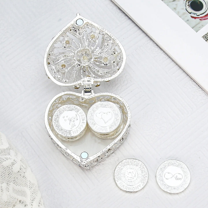 Silver heart-shaped keepsake box filled with 13 English words unity coins, perfect for Catholic wedding Arras tradition, symbolizing blessings of love, unity, and prosperity - tingkucoins.com