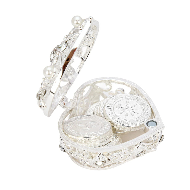 Silver heart-shaped keepsake box with diamond and pearl accents, holding 13 Spanish words coins, a perfect marriage keepsake - tingkucoins.com