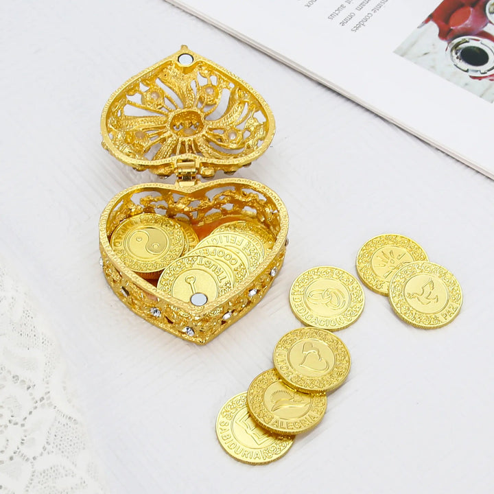 Luxurious gold heart-shaped pearl box with 13 beautifully detailed Spanish word coins, ideal for Catholic weddings, bridal keepsakes, and timeless marriage ceremony traditions - tingkucoins.com